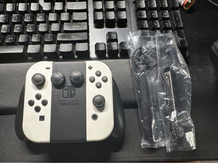 Nintendo Switch OLED with Grey JoyCons - Own4Less Nintendo Switch OLED Gaming Console with Joy-Con Controllers